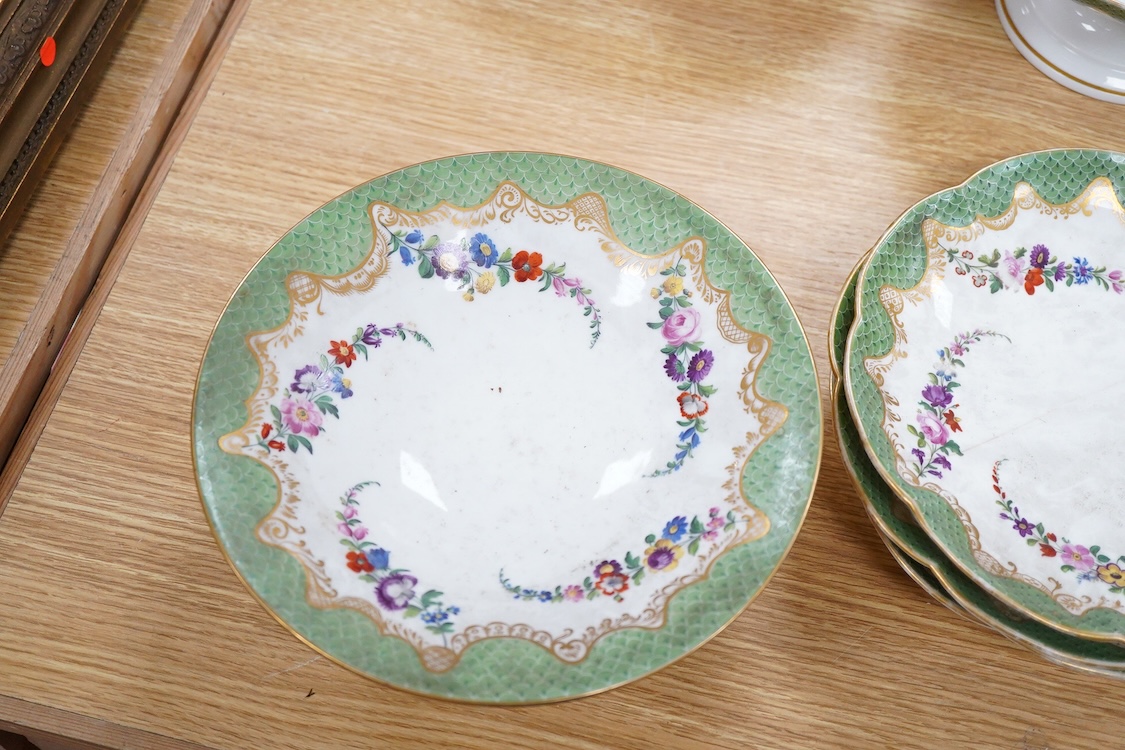 A 19th century French Paris porcelain part dessert service with green scale borders by Nast Paris, largest 26cm wide